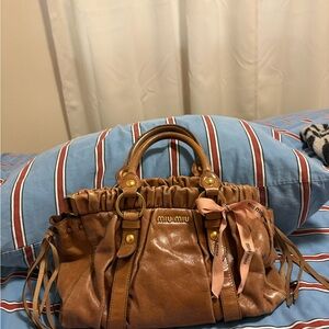 Miu Miu vitello lux handbag with long strap